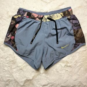 Nike floral gold shorts